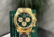 劳力士迪通拿金绿迪。